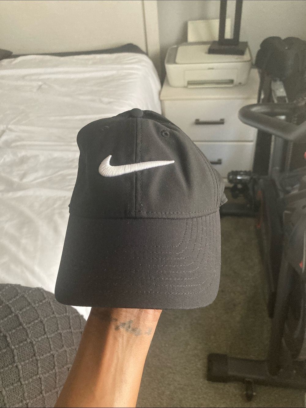 Nike Black Hat with White Swoosh Logo